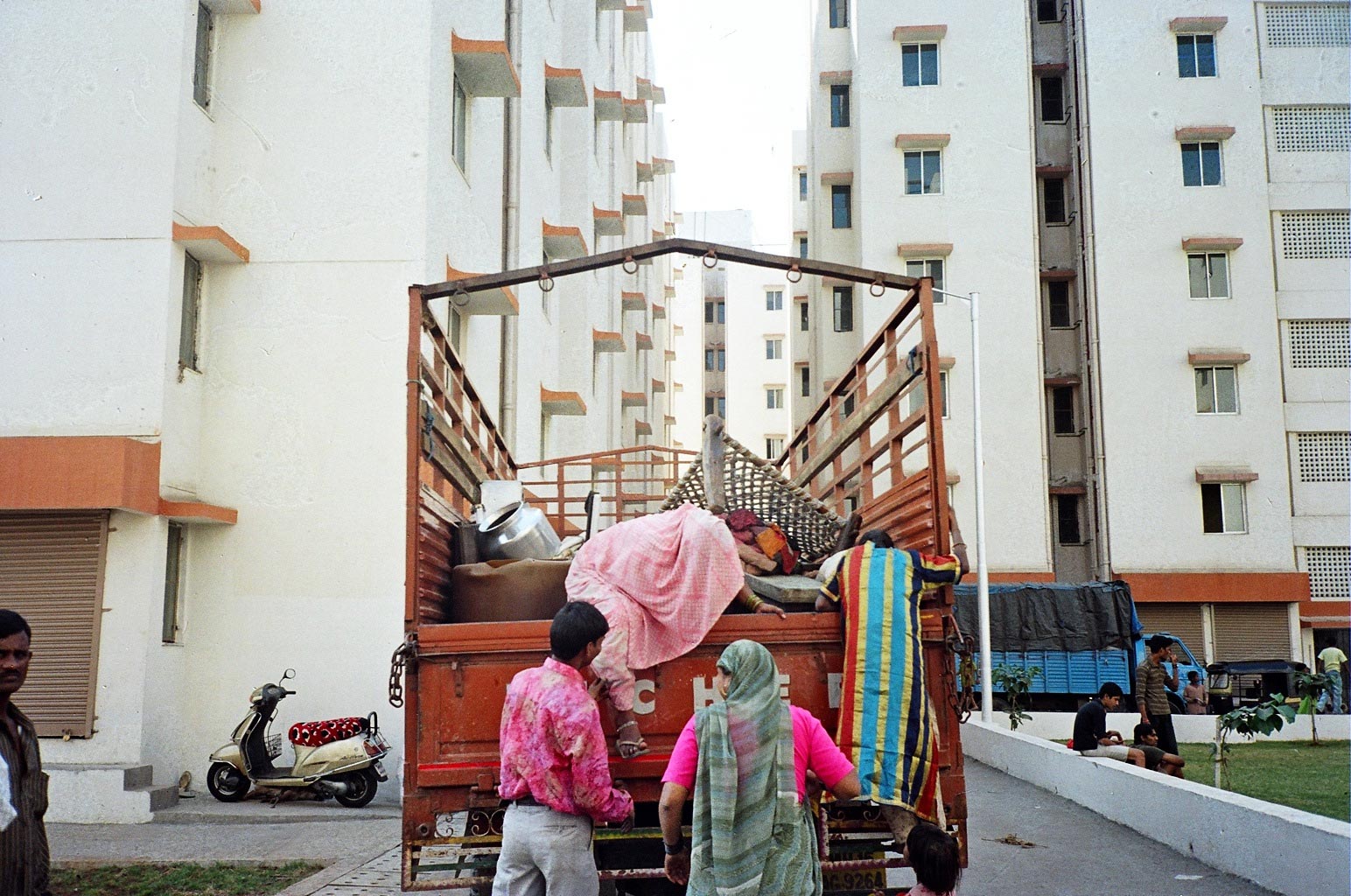 People moving into their new homes at Vashi Naka, Mumbai from settlements near the Railway tracks as part of the resettlement and rehabilitation program under the Mumbai Urban Transport Project (MUTP).