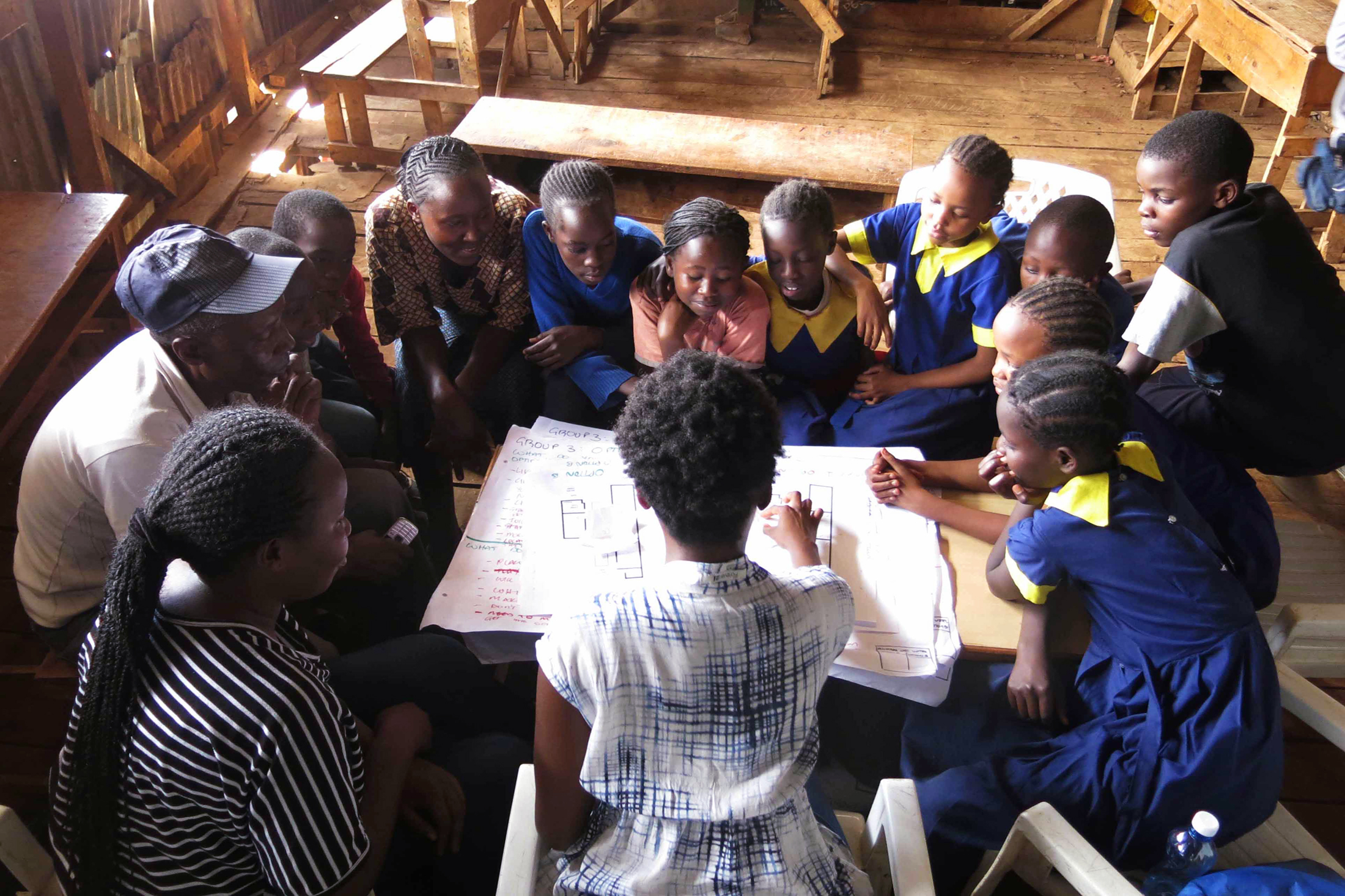 Bukonola Ngobi (Urban Design Coordinator) leads a design workshop for schoolkids at the Anwa Productive Public Learning Space in late 2015. Image Credit: Jesús Porras (KDI)